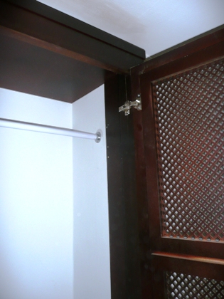dark stained fitted alcove wardrobes