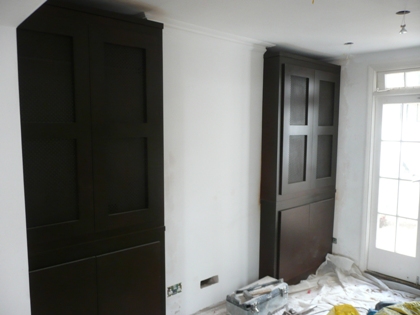 dark stained fitted alcove wardrobes